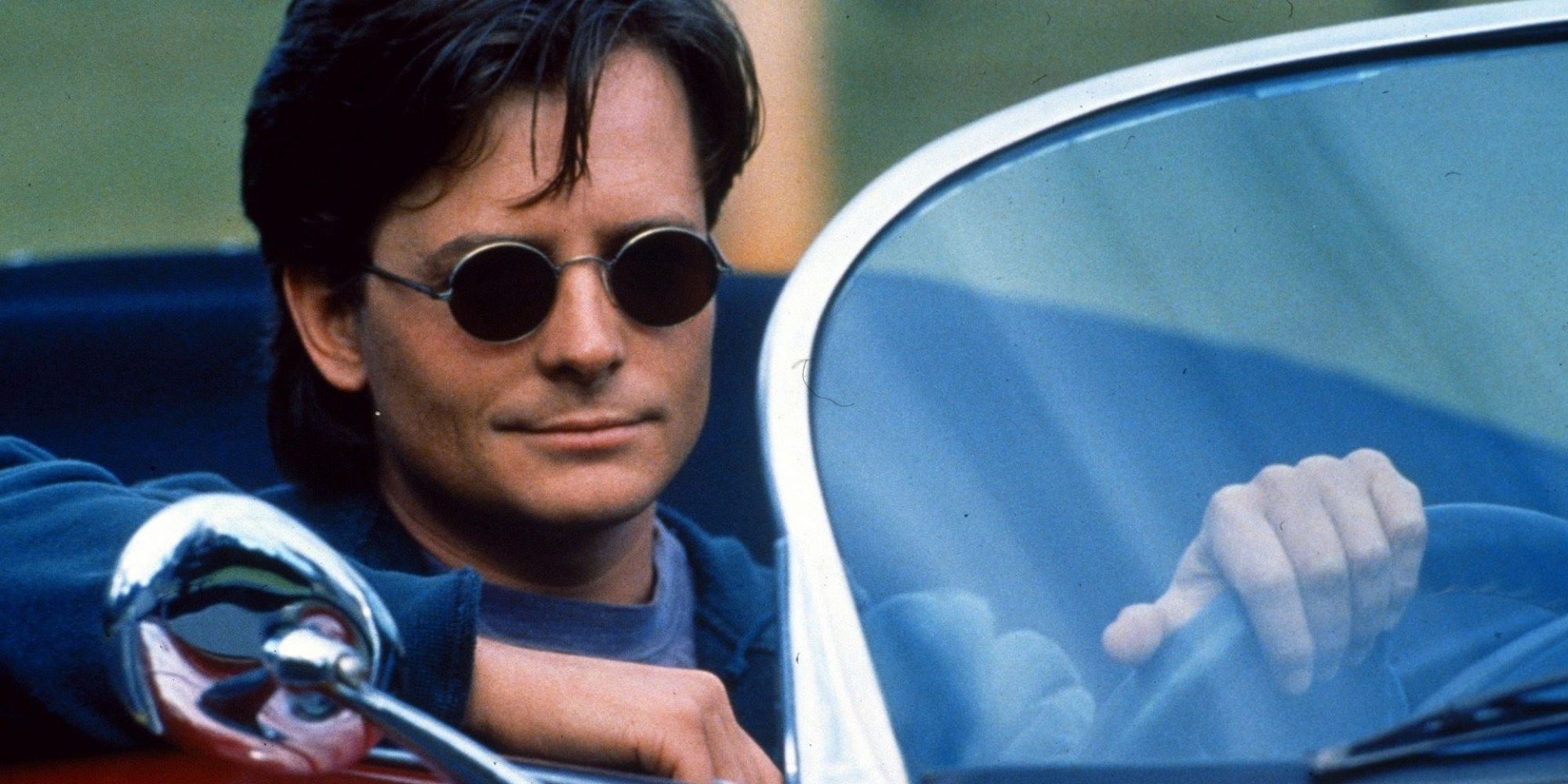Michael J. Fox sebagai Ben dari Doc Hollywood mengendarai mobilnya