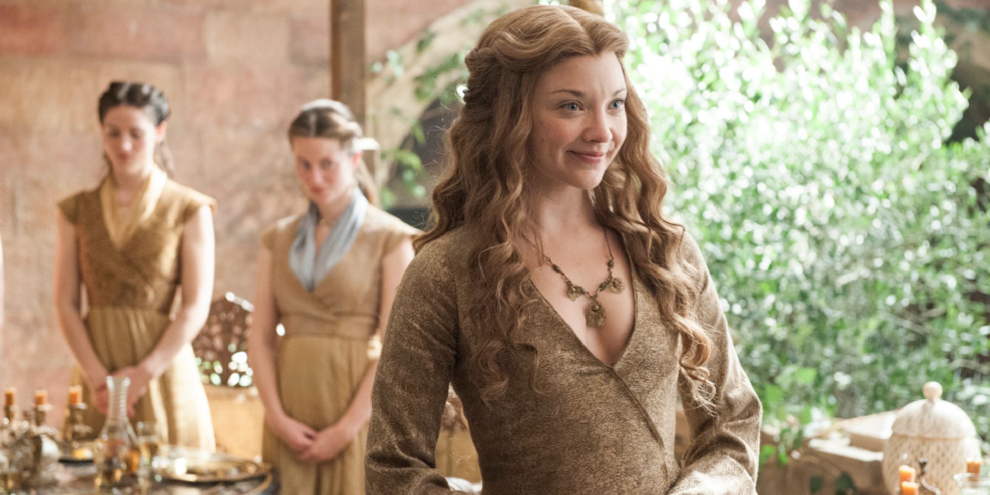 Natalie Dormer as Margaery Tyrell smiling widely in Game of Thrones