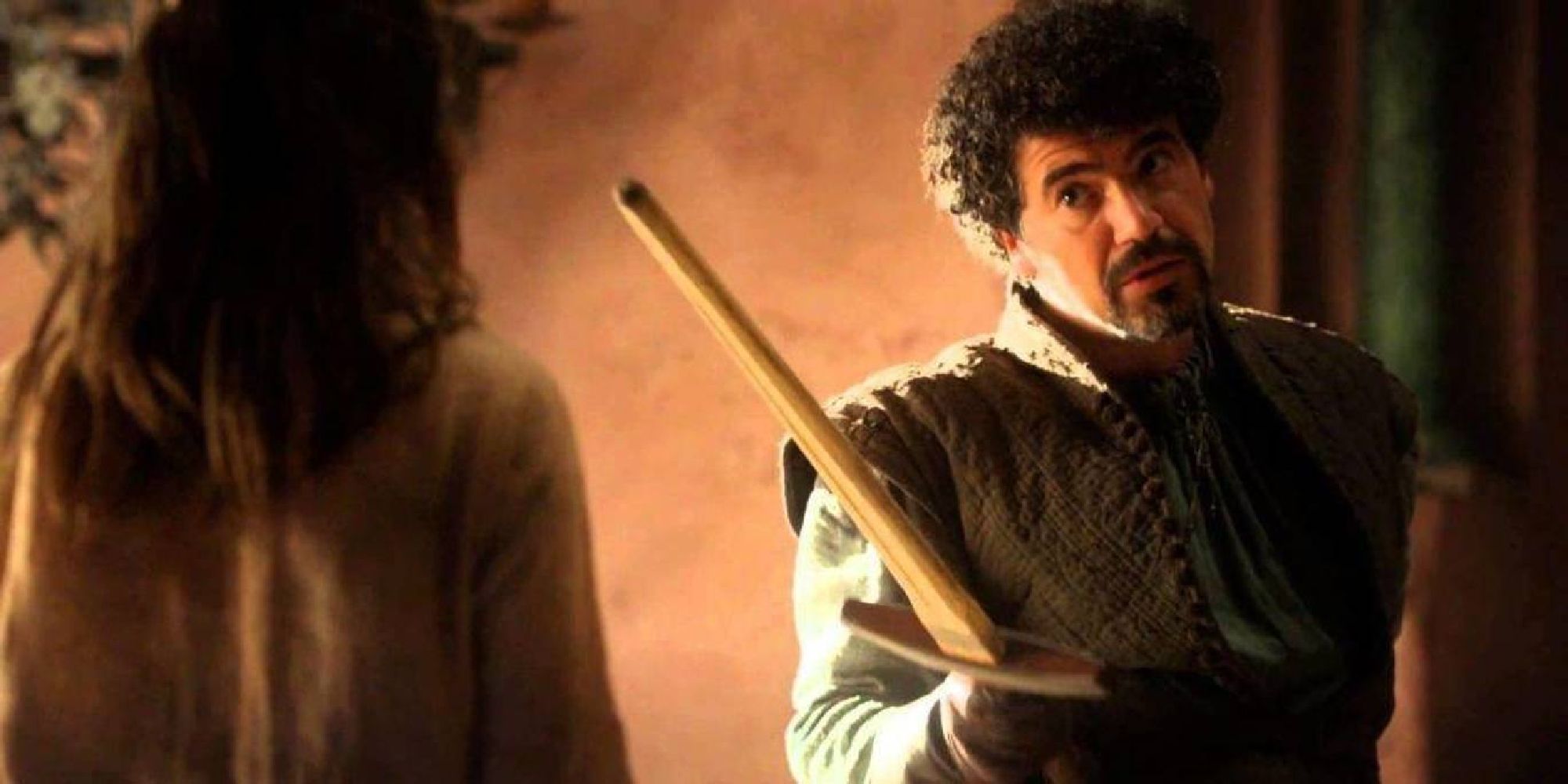 Syrio Forel aiming a wooden sword in Game of Thrones