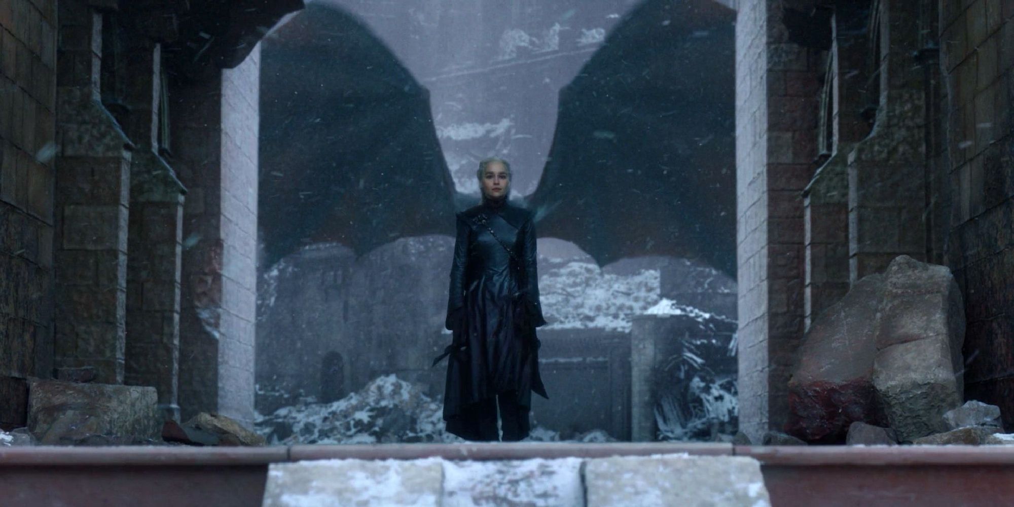 Daenerys Targaryen with her dragons wings unfurled behind her in the Game of Thrones series finale