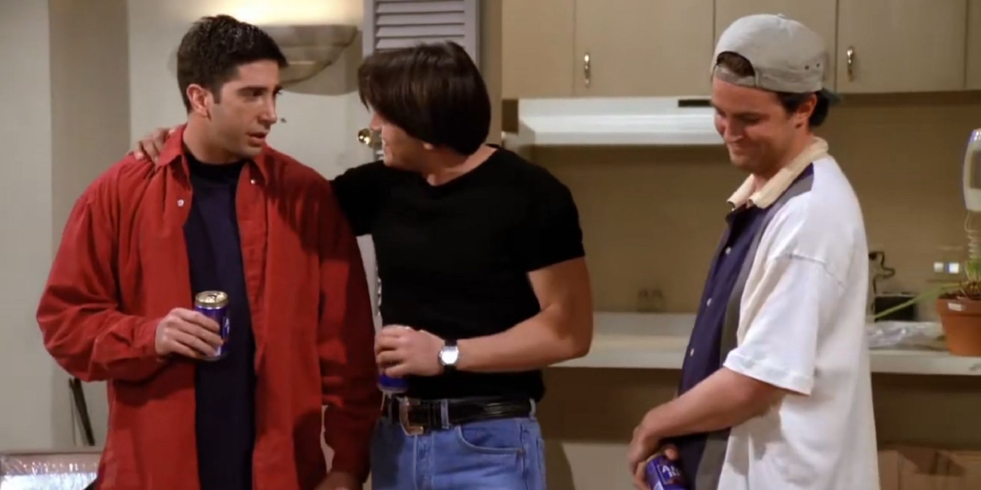 Joey giving advice to Ross while Chandler looks on