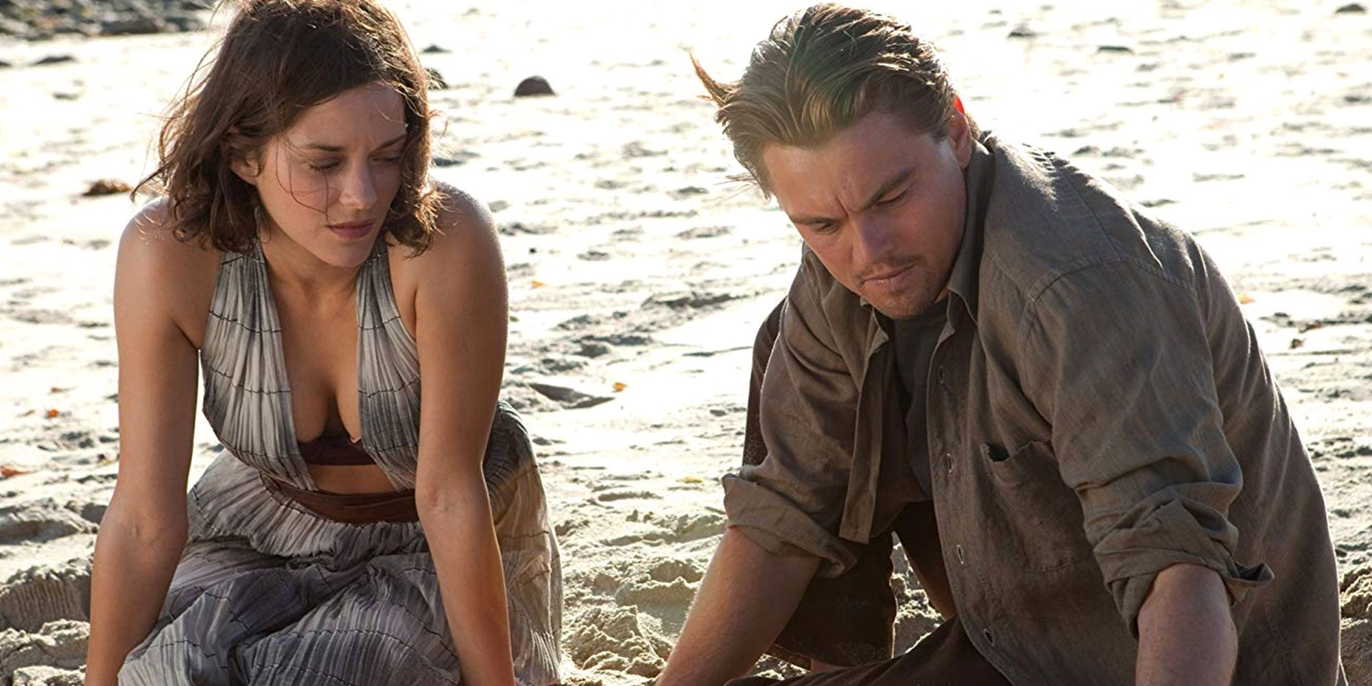 Cobb and Mal on the beach in Inception.