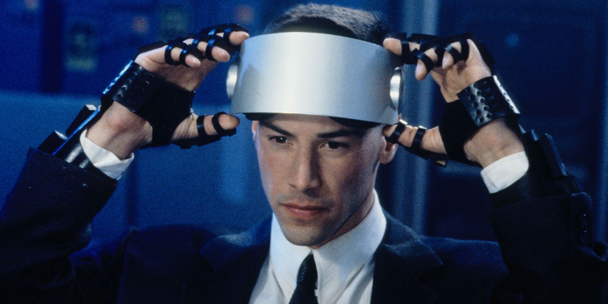 Johnny Mnemonic about to put on an eye mask.