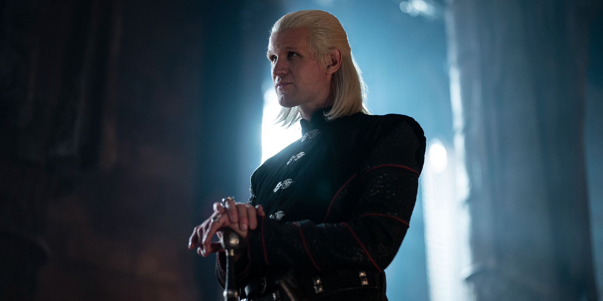 Matt Smith as Daemon Targaryen standing in the Throne Room in Game of Thrones.