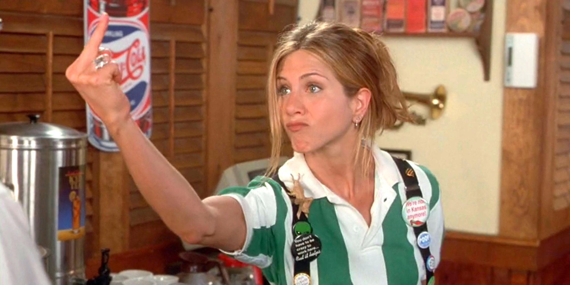 Joanna from Office Space pointing her middle finger 