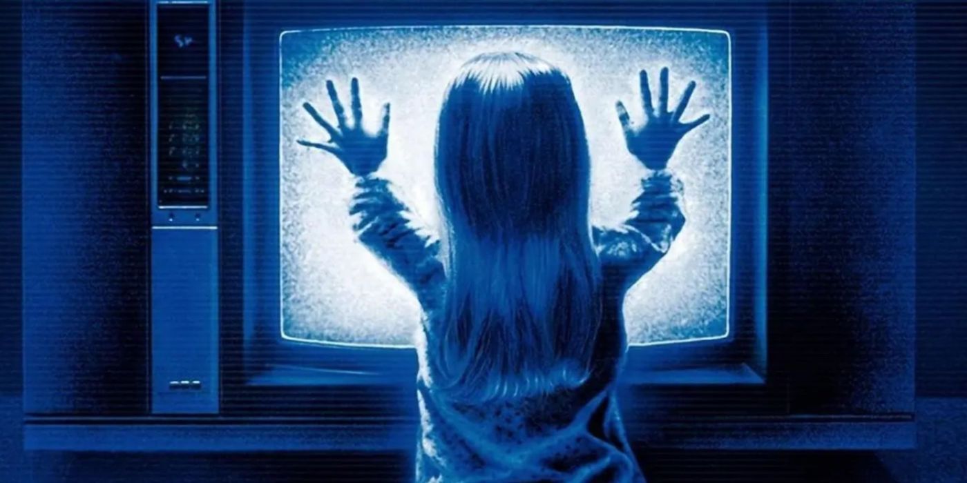 A little girl places her hands upon a static TV screen as a ghostly blue light permeates from the screen.