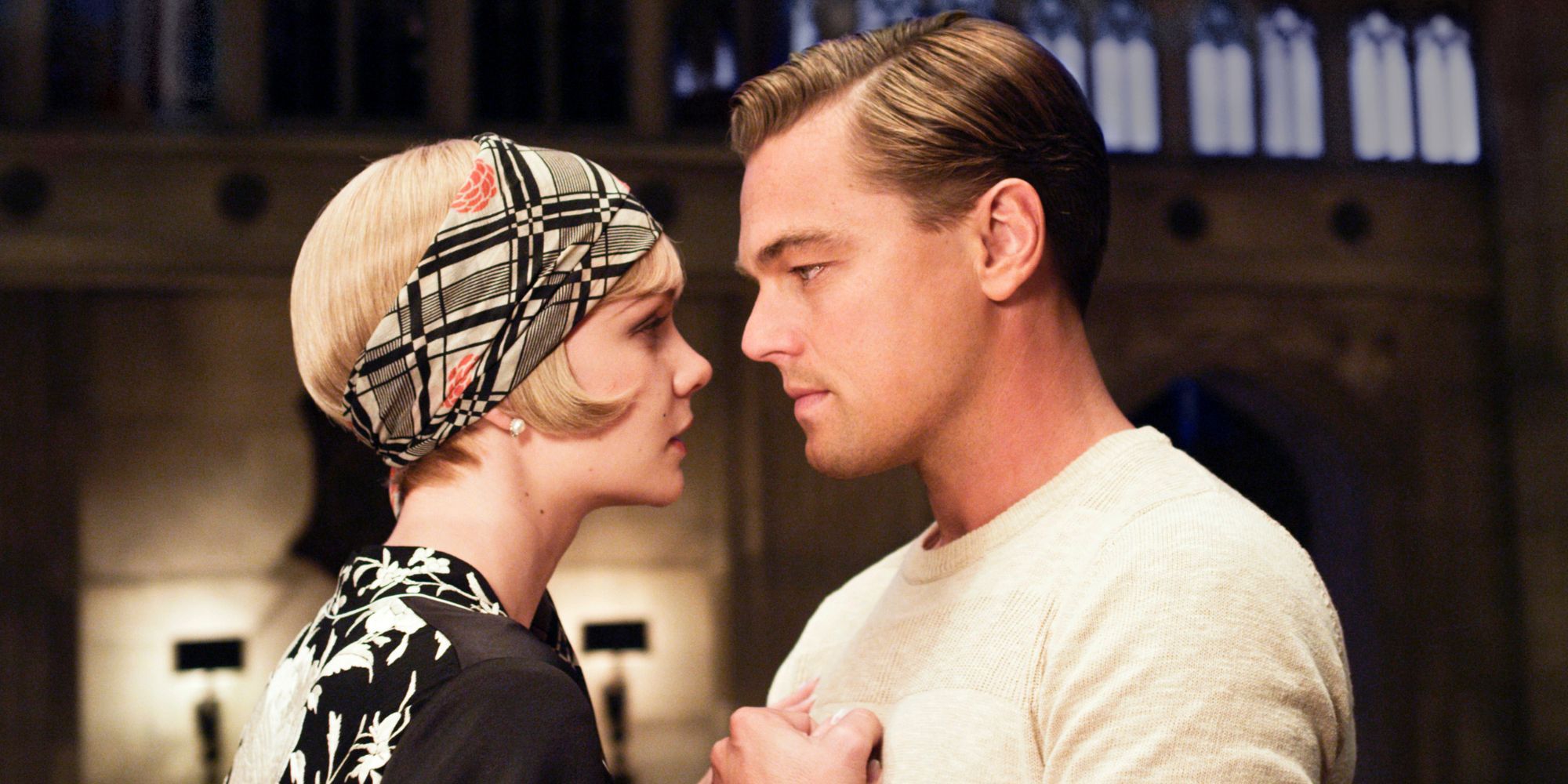 Daisy and Jay from The Great Gatsby standing together