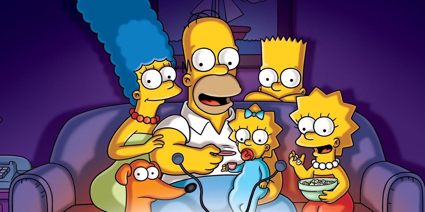 The Simpsons sitting around the TV
