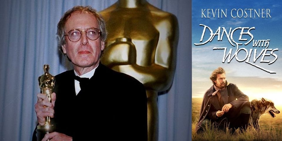 John Barry pose avec son Oscar à côté de l'affiche de Danse avec les loups.