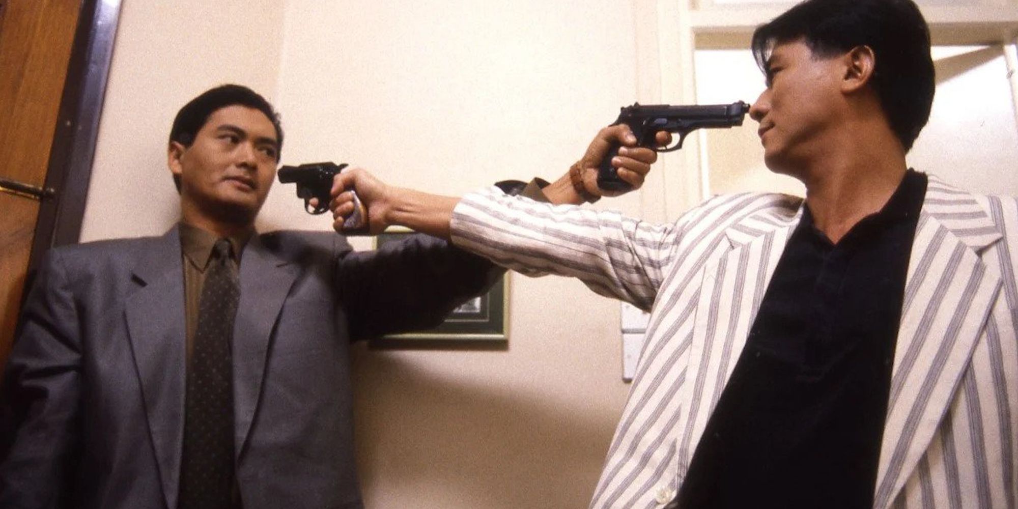 Two men in a Mexican standoff in A Better Tomorrow
