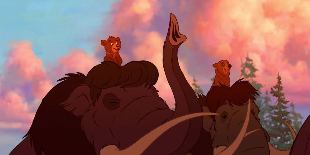 Kenai and Koda riding on the backs of mammoths.