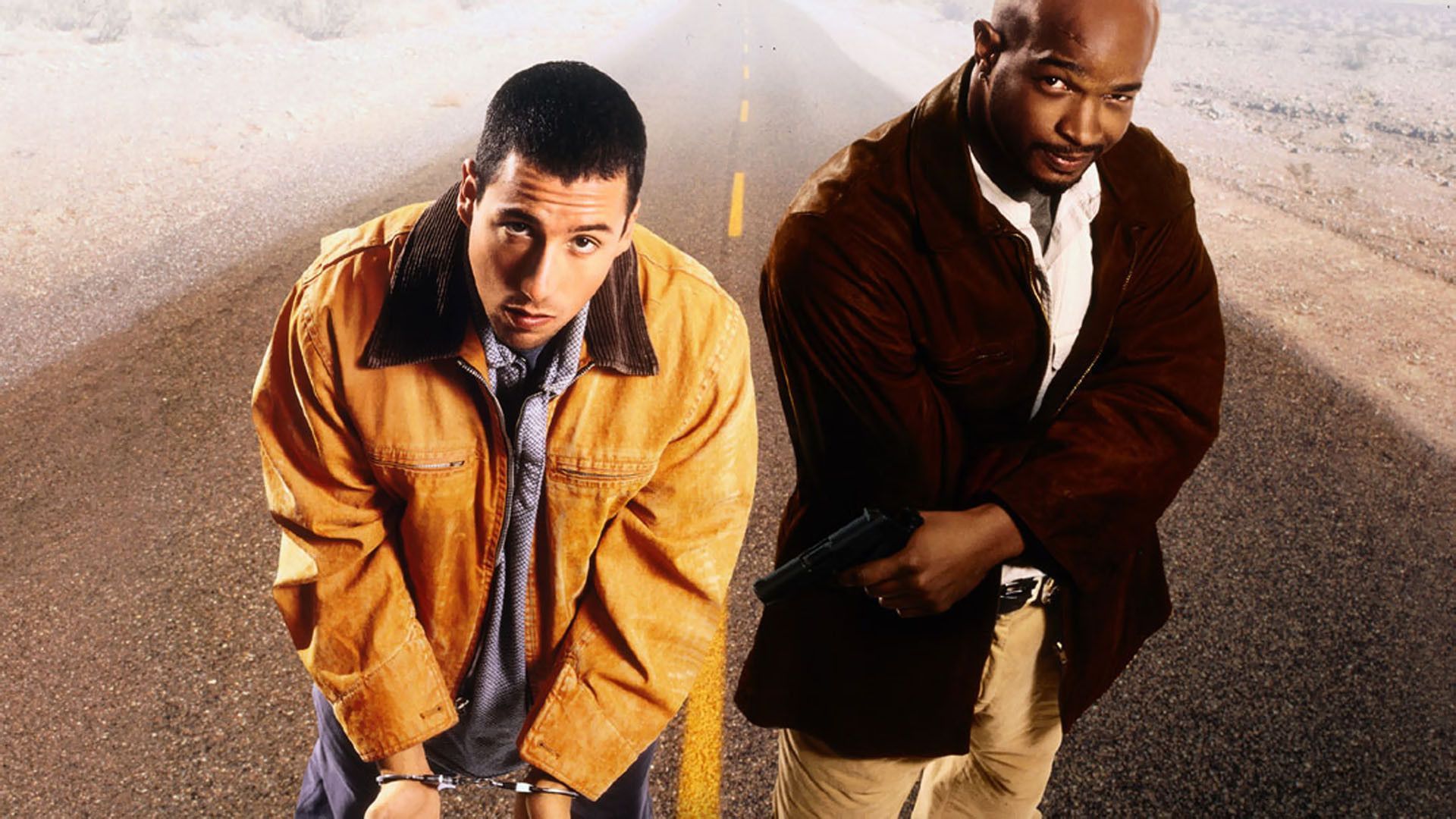 Adam Sandler as Archie and Damon Wayans as Jack on road in Bulletproof