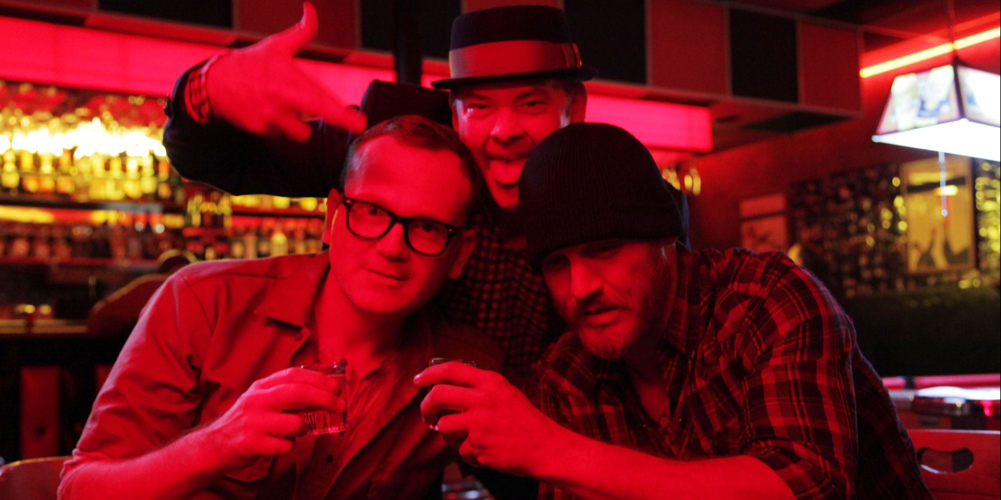 Three men drinking in a bar