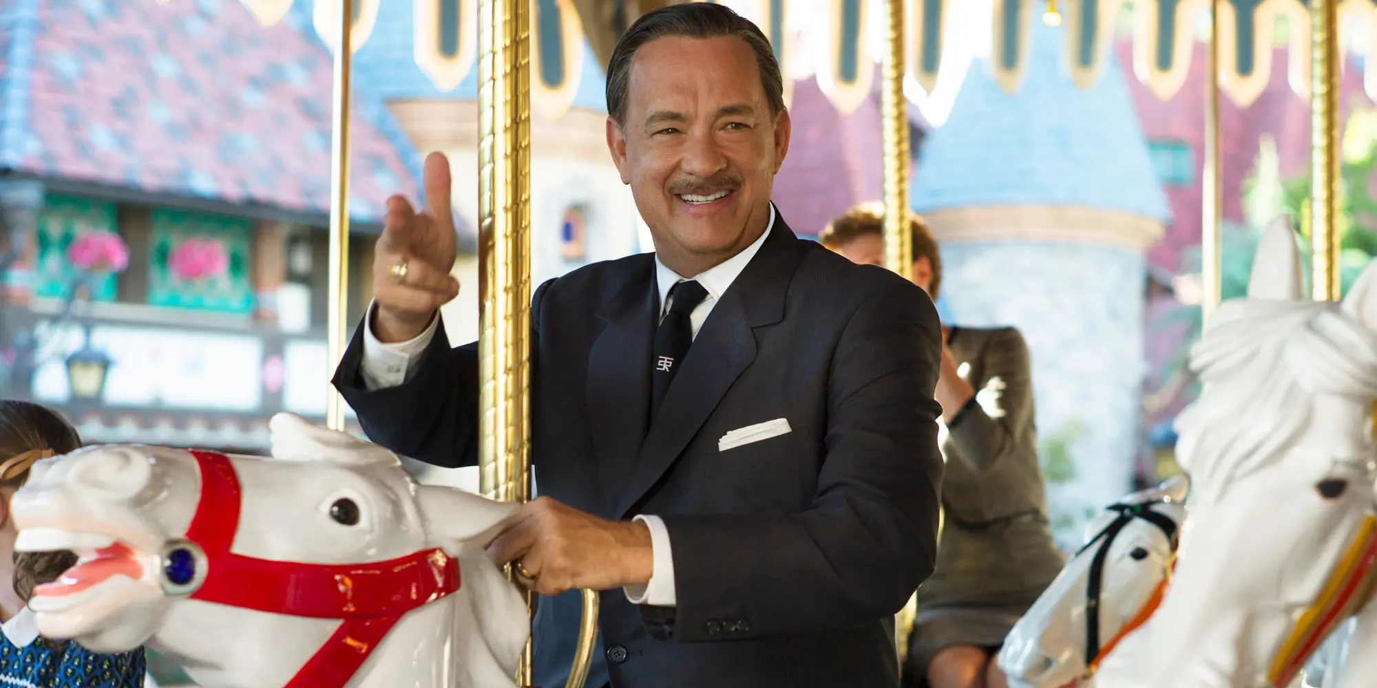 Tom Hanks as Walt Disney riding a caroussel in Saving Mr. Banks