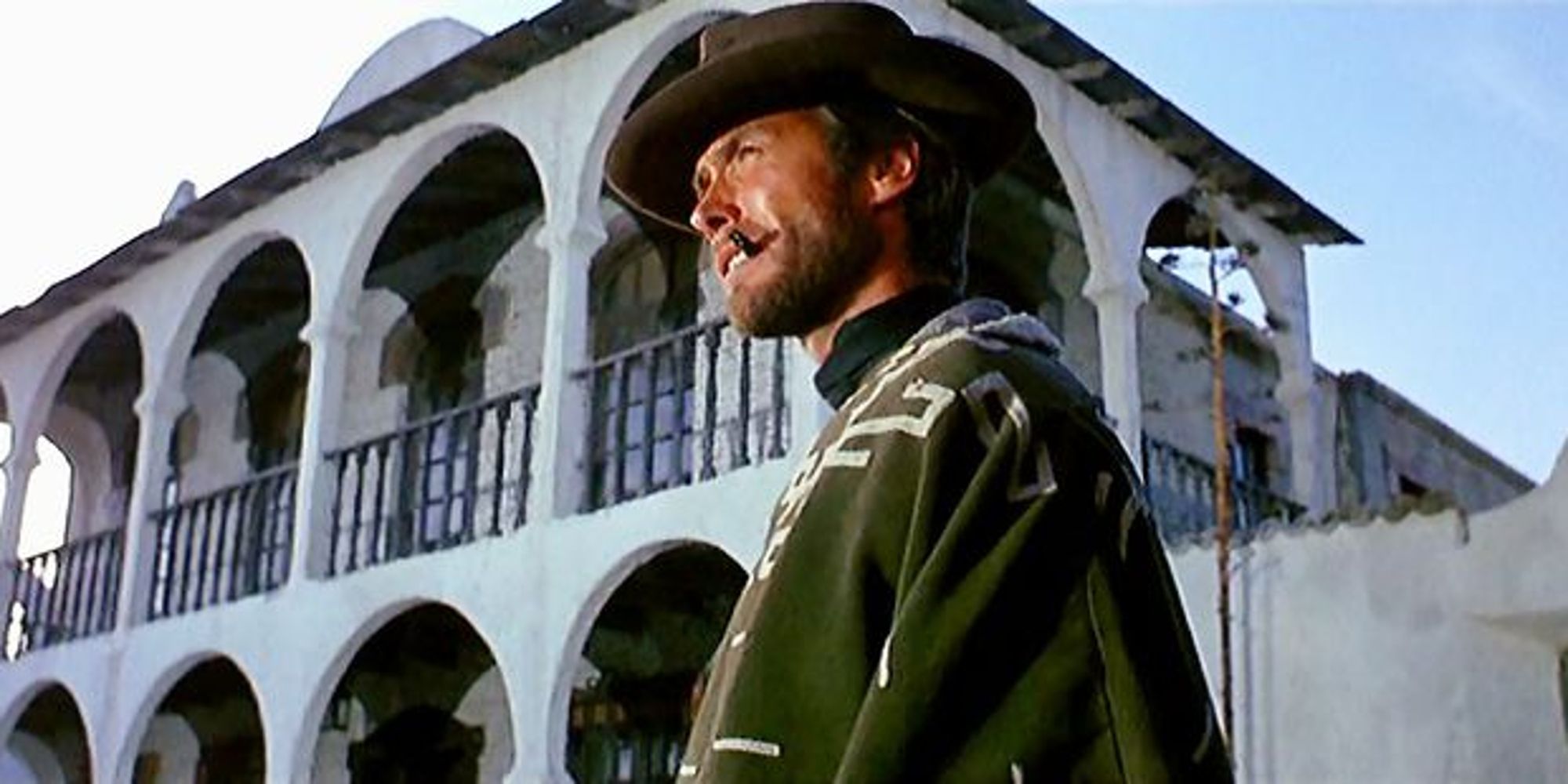 Clint Eastwood standing in alone in A Fistful of Dollars (1964)