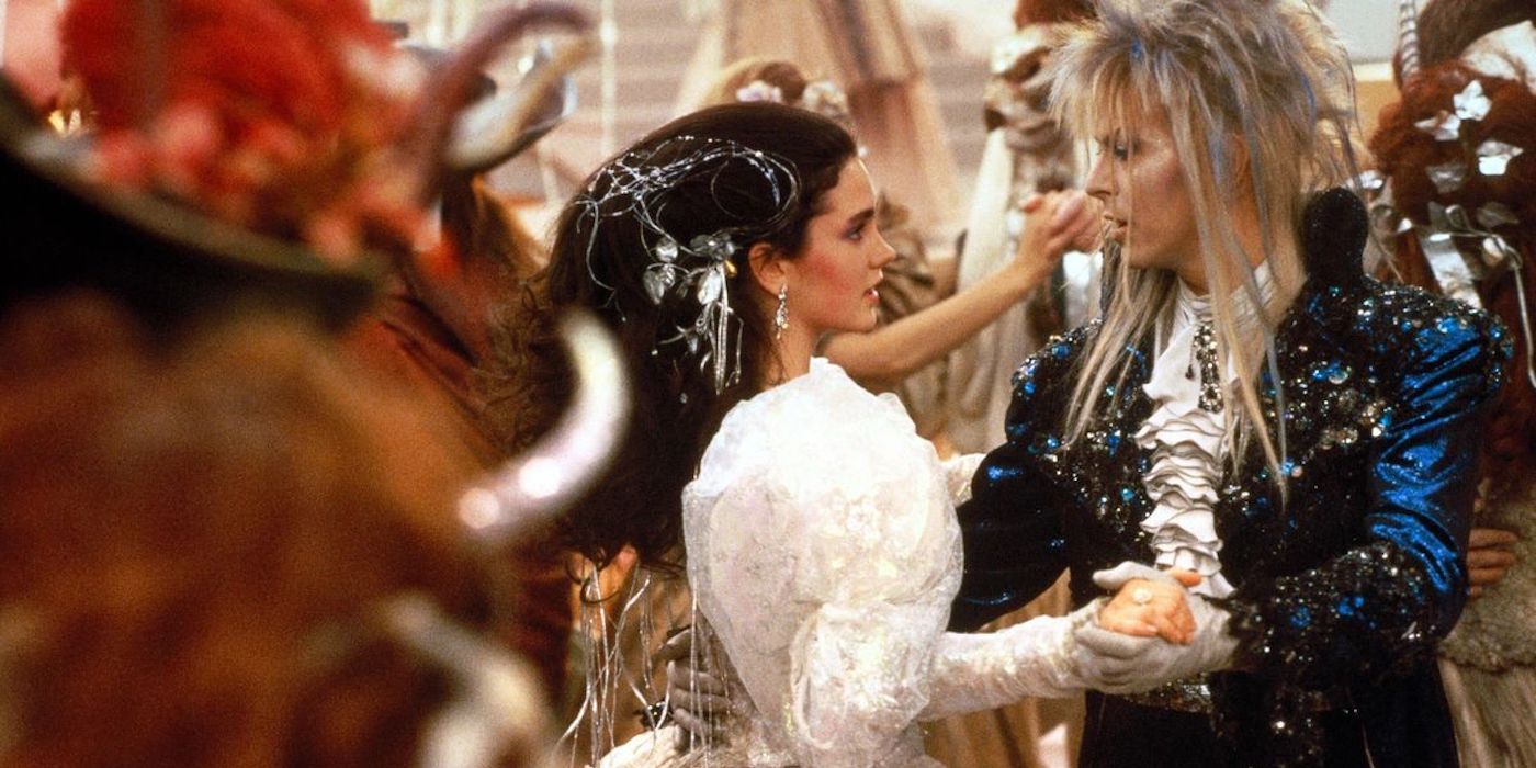 Jennifer Connelly And David Bowie dance at a costume ball in Labyrinth.