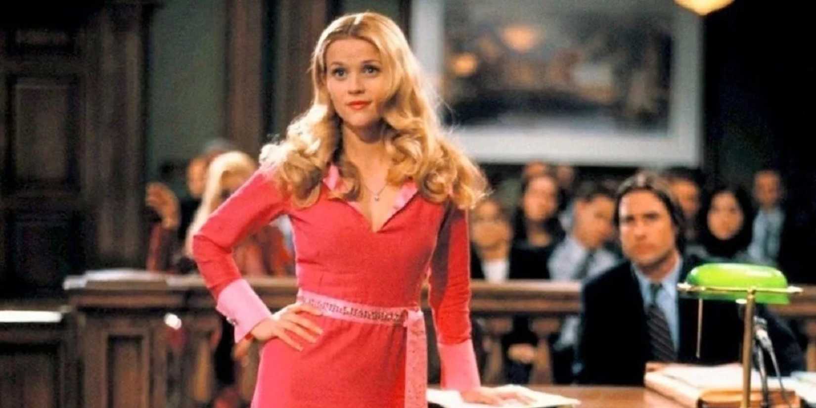 Elle Woods at court with one hand on her waist looking serious in the film Legally Blonde