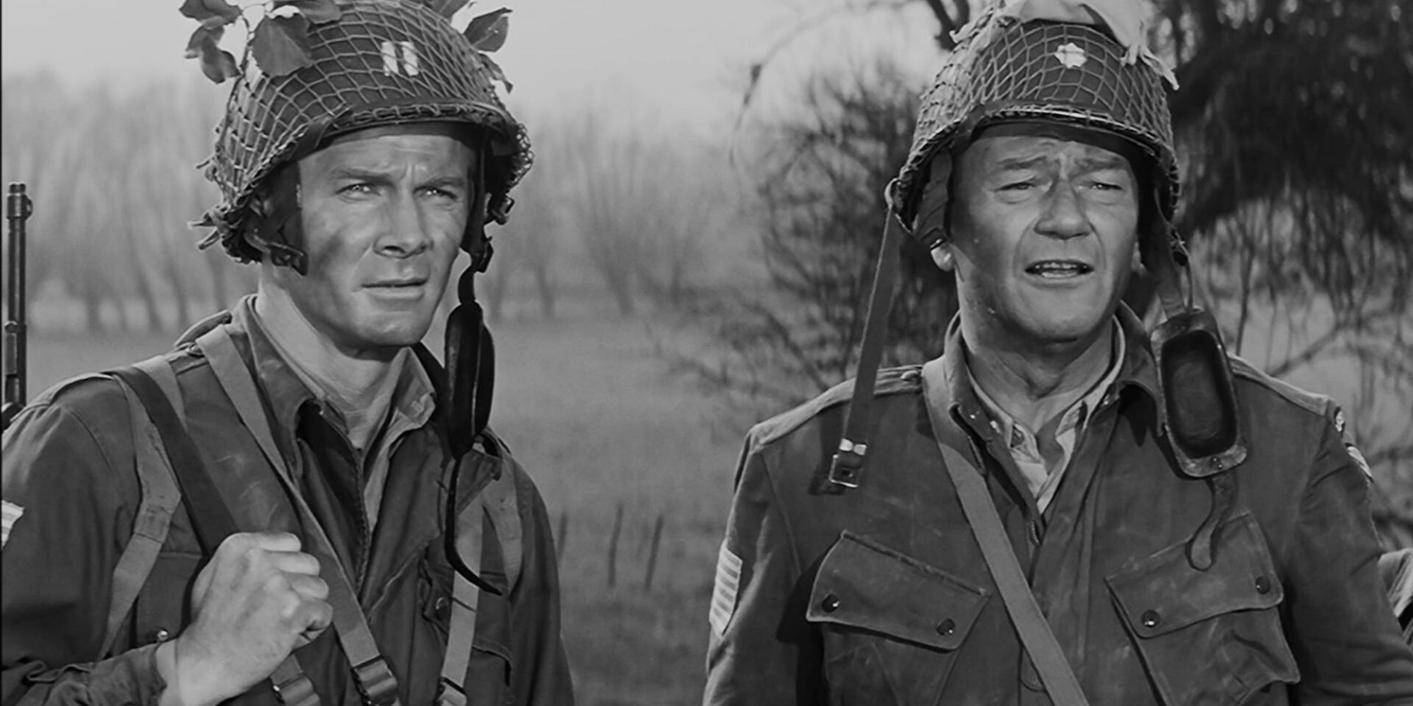 Two WW2 era paratroopers converse in "The Longest Day"