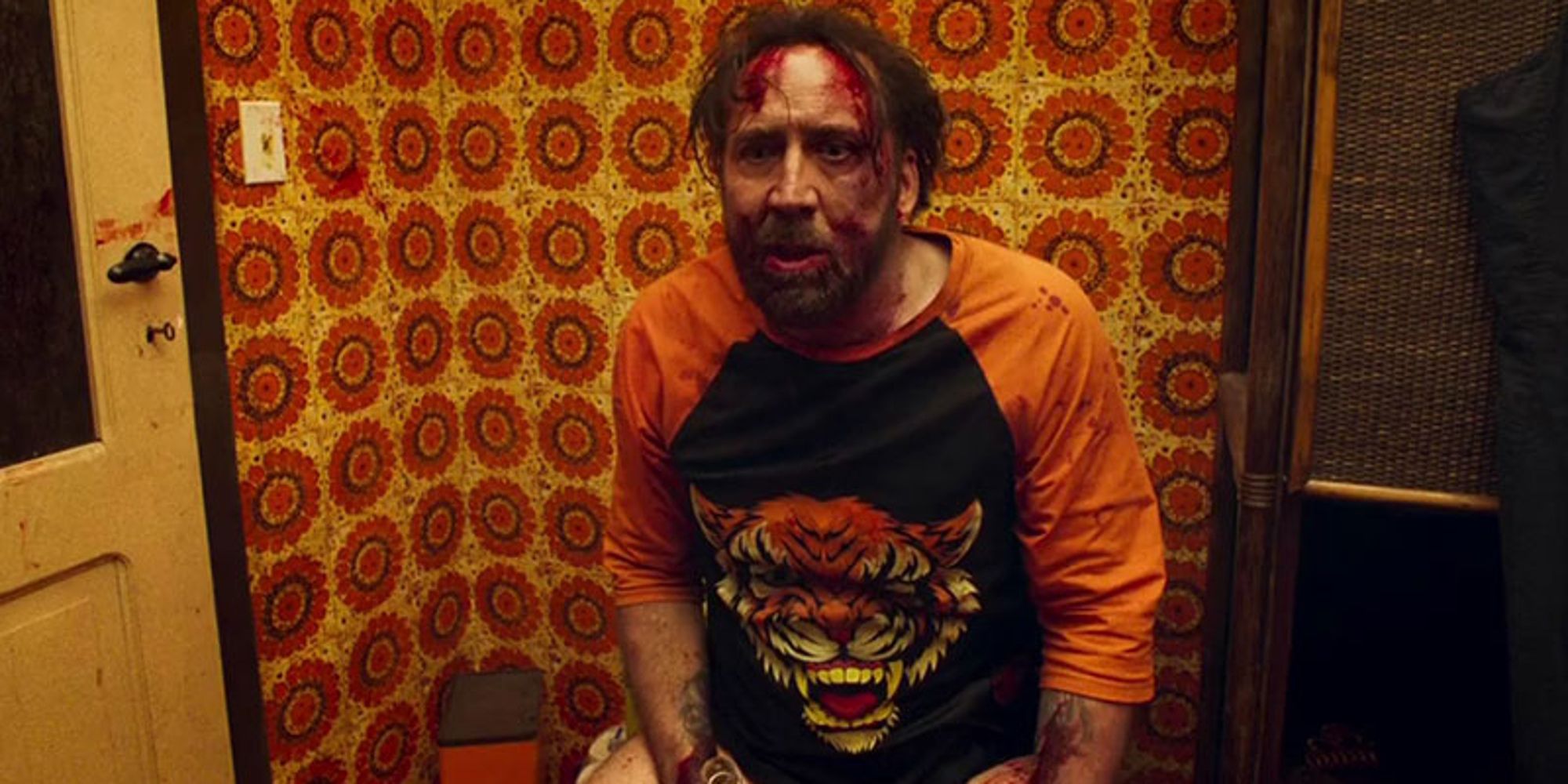 Um maldito Nicolas Cage sentado no vaso sanitário