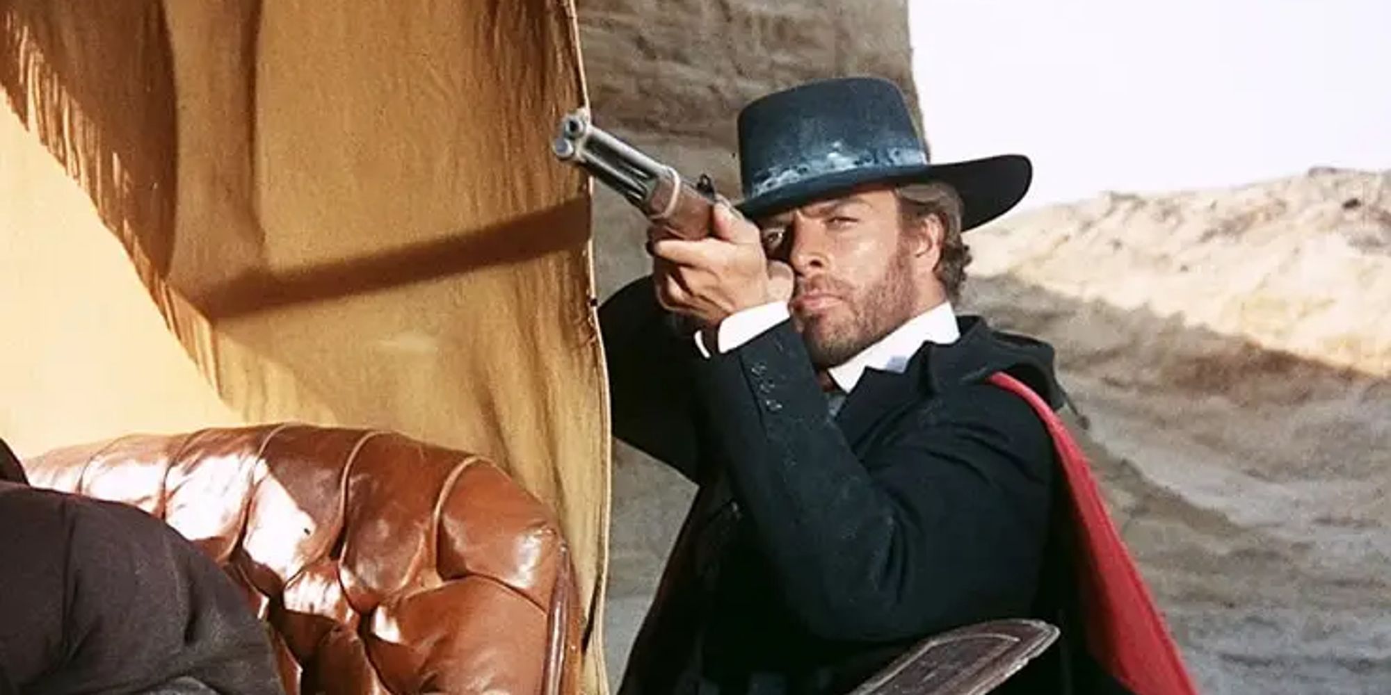 A gun-toting vigilante aims a rifle while standing on the back of a carriage.