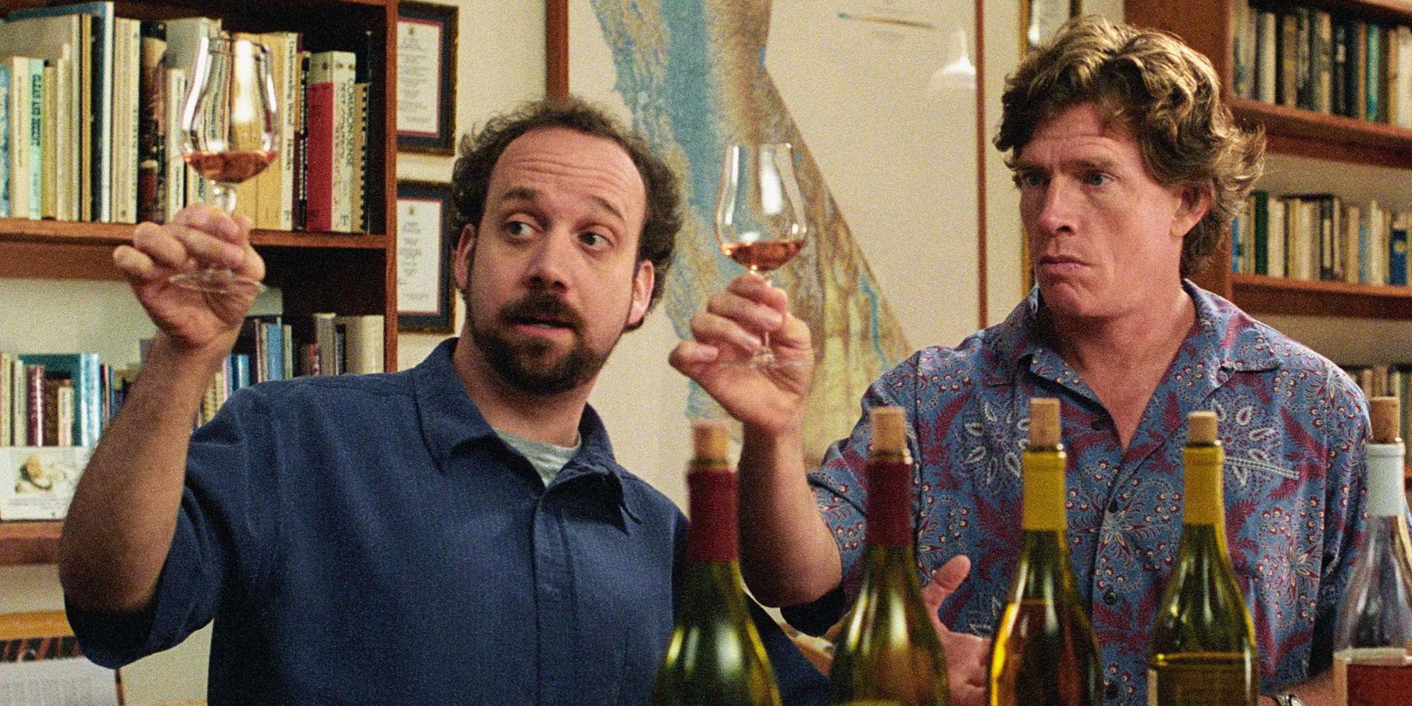 Paul Giamatti and Thomas Haden-Church as Miles and Jack toasting with glasses of wine in Sideways