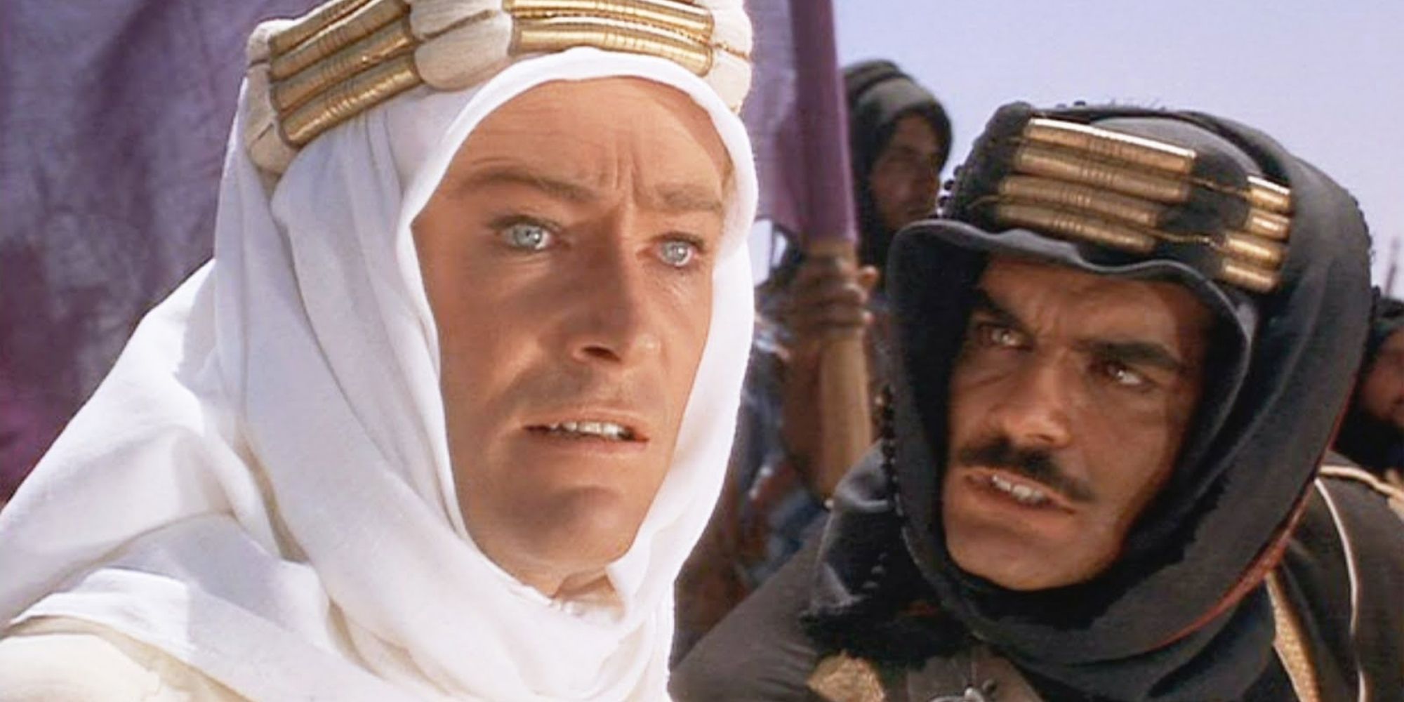 T.E. Lawrence speaks with a member of the Arab guerrilla fighters in "Lawrence of Arabia"