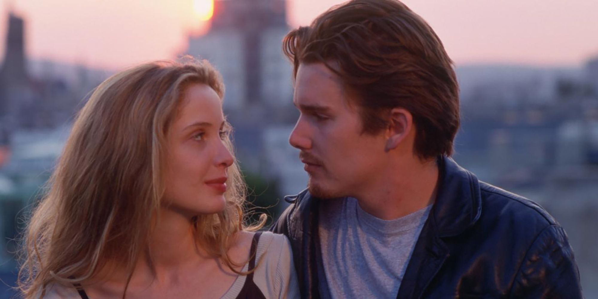 Jesse and Celine looking at each other lovingly in Before Sunrise