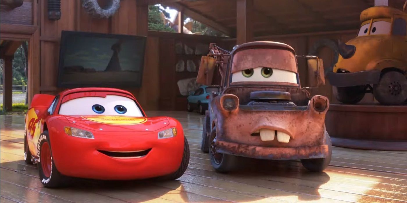 Lightning McQueen looks joyous while Mator looks disinterested as the pair look through a car museum in 'Cars 2'.