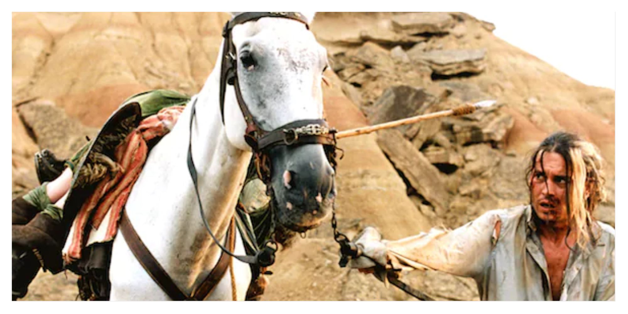 Johnny Depp wrangling a horse in Lost in La Mancha