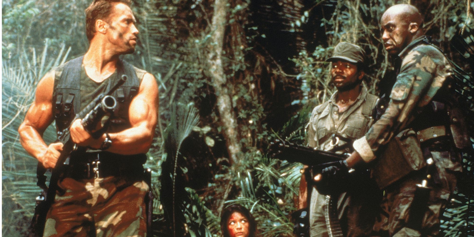 Soldiers out in the jungle waiting to see the Predator 