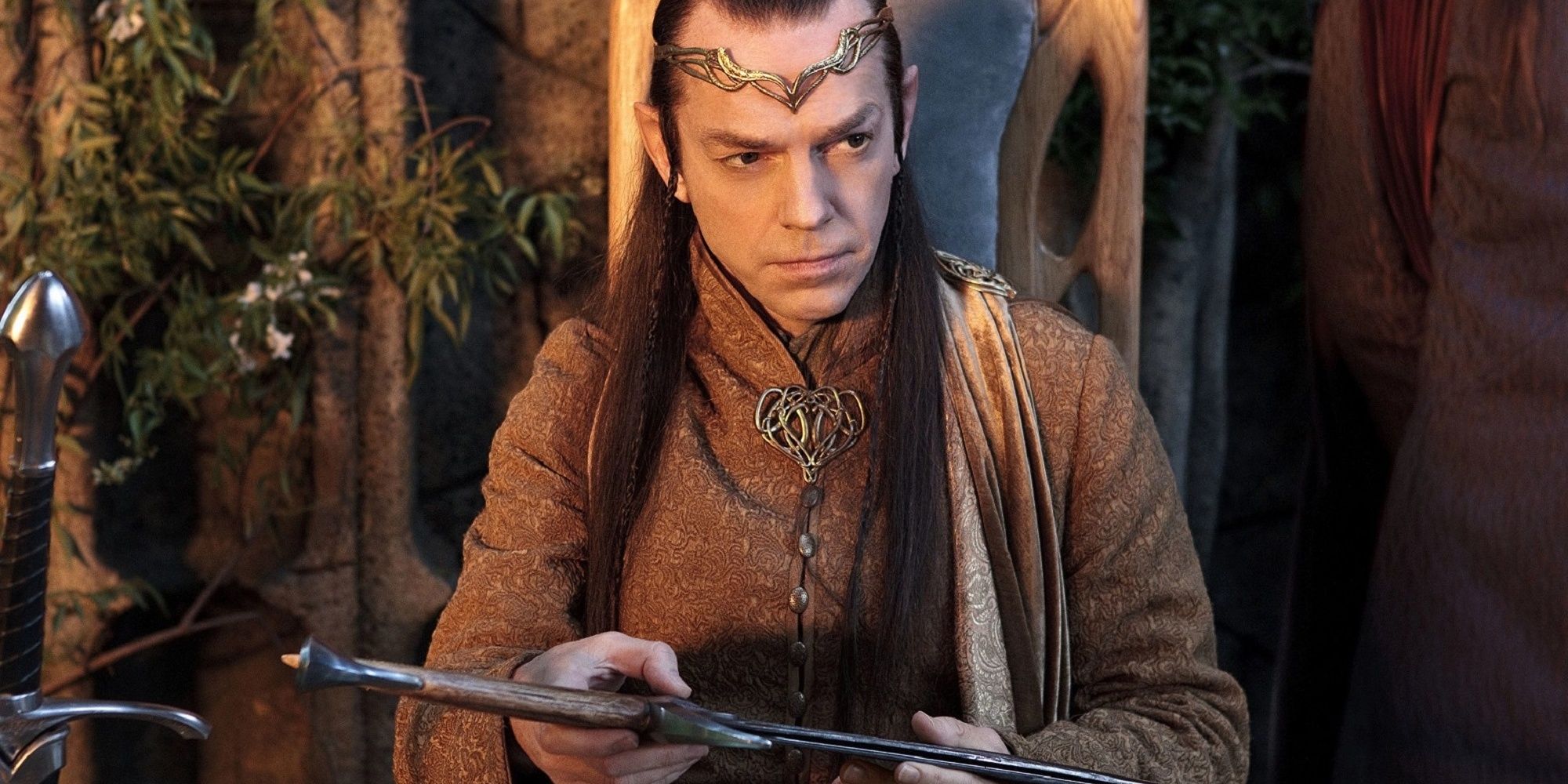 Elrond handing over his sword in Rivendell in The Lord of the Rings: The Fellowship of the Ring
