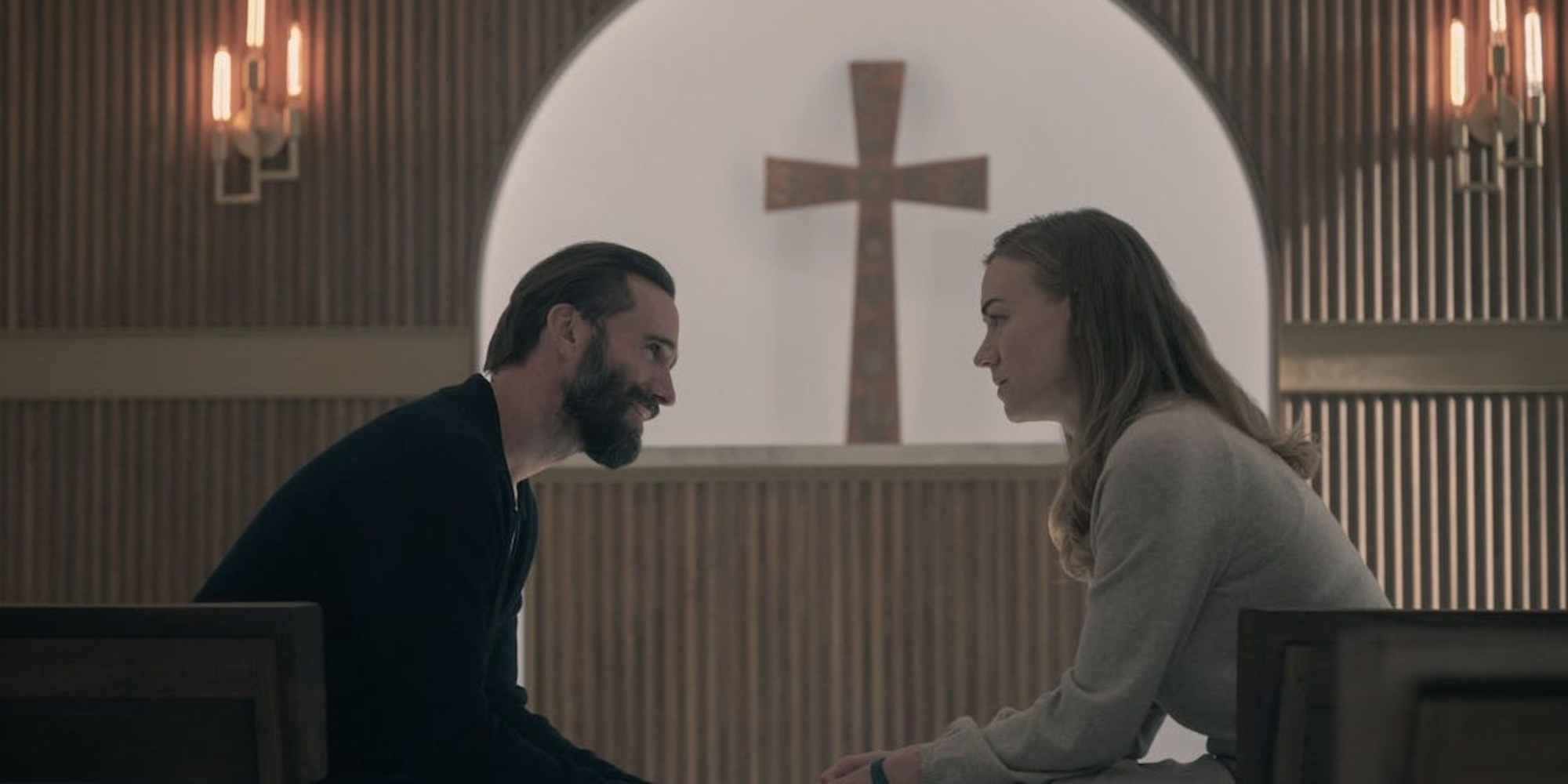 Fred and Serena Joy at a church