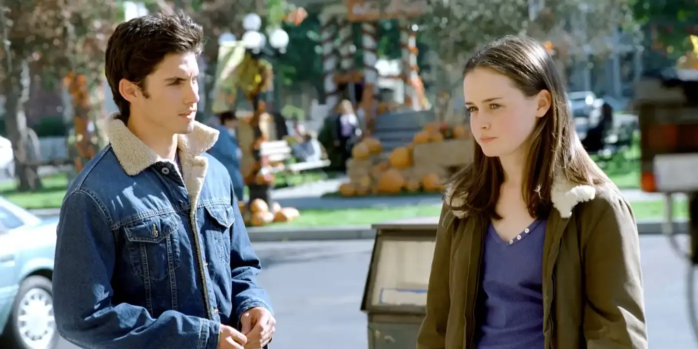 Milo Ventimiglia and Alexis Bledel as Jess and Rory talking on the street in Gilmore Girls