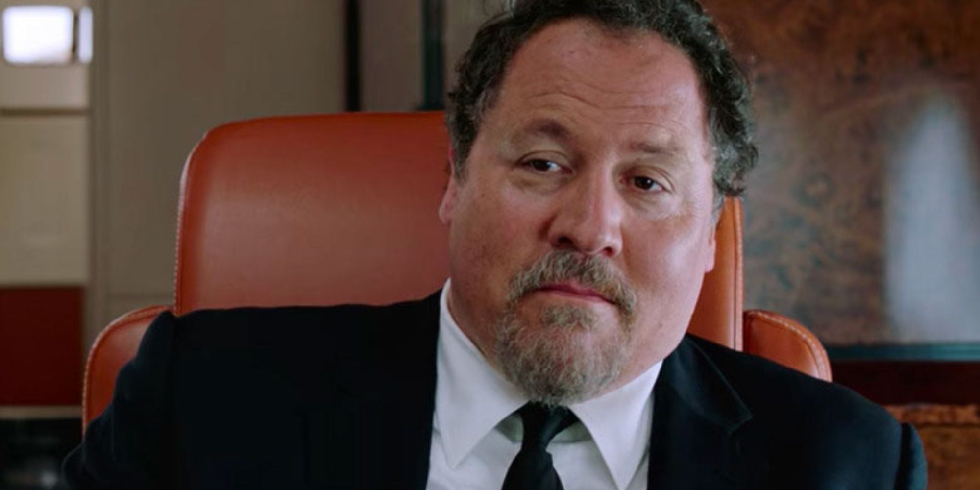 Happy Hogan smiling at someone off-camera in Spider-Man: Far From Home