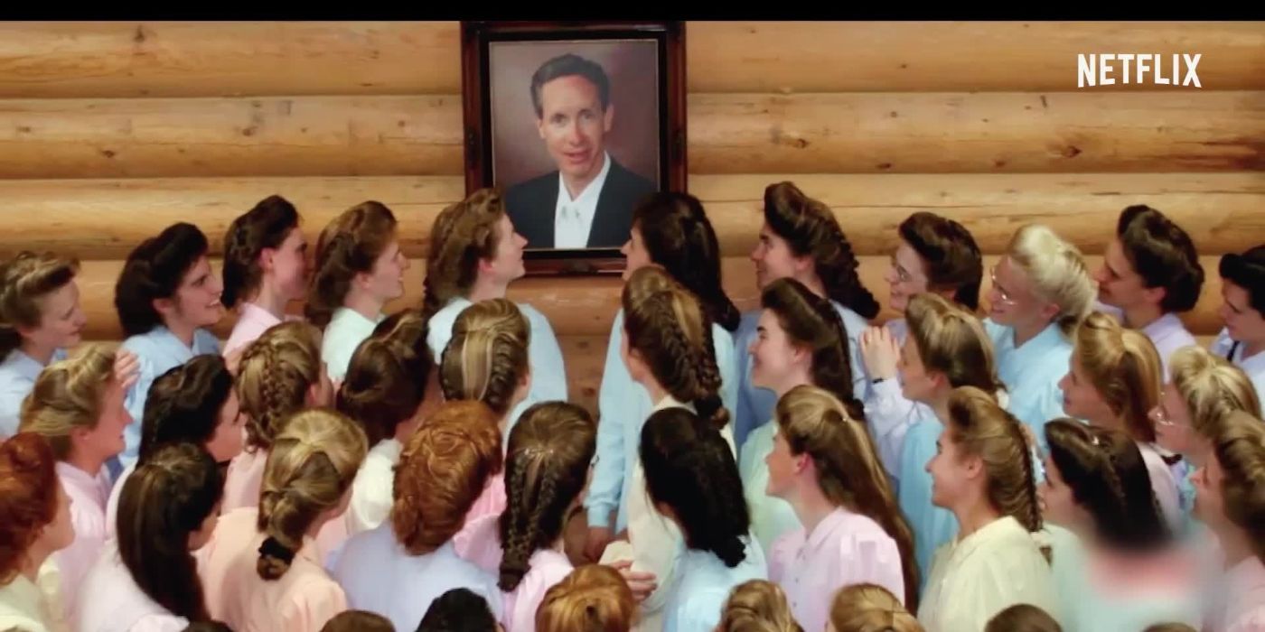 The women of FLDS gazing at a picture of Warren Jeffs, their leader