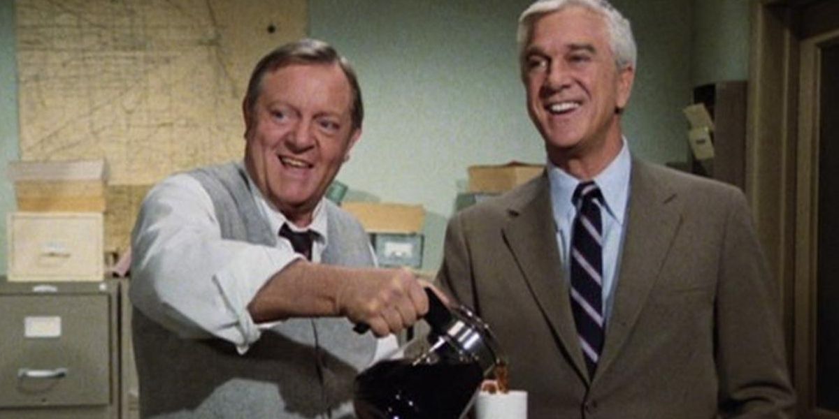 Leslie Nielsen and Alan North having coffee in Police Squad 