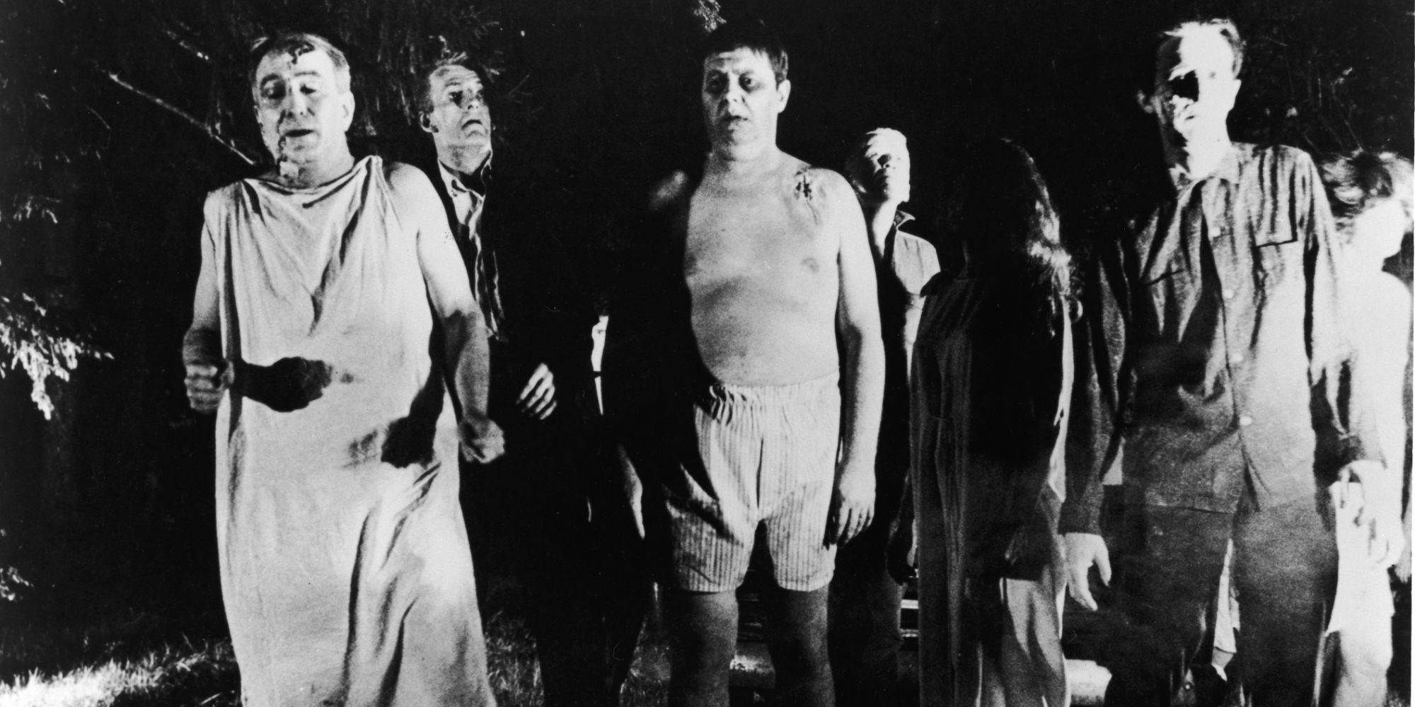A group of zombie marching in the dark