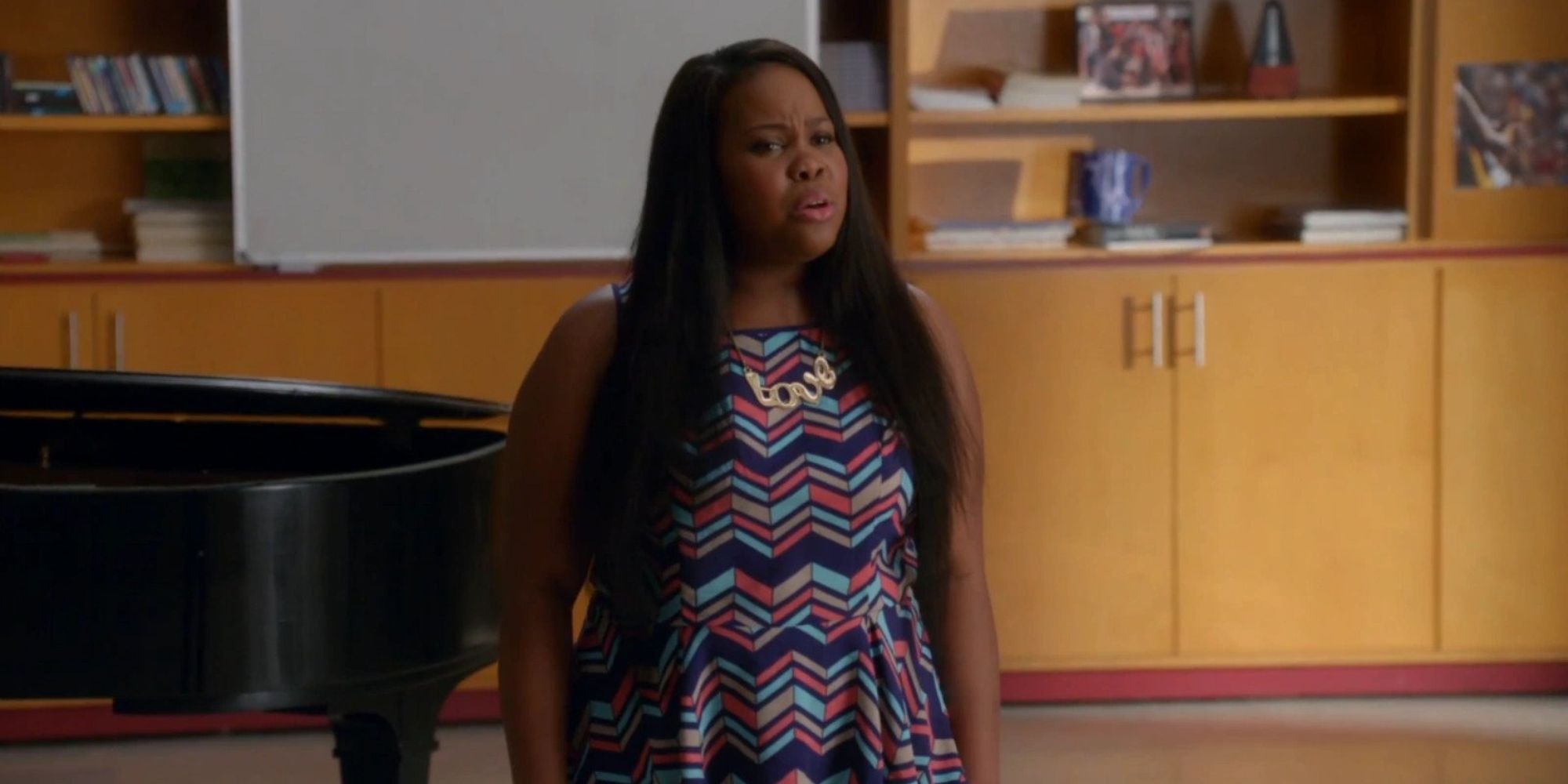 Mercedes Jones singing in the choir room in Glee