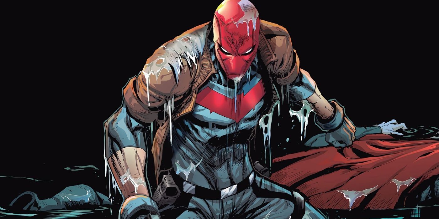 Red Hood posing menacingly while covered in white liquid in DC Comics.