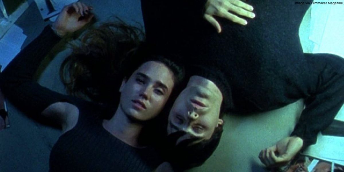 Marion and Harry laying on the floor while under the influence in Requiem for a Dream
