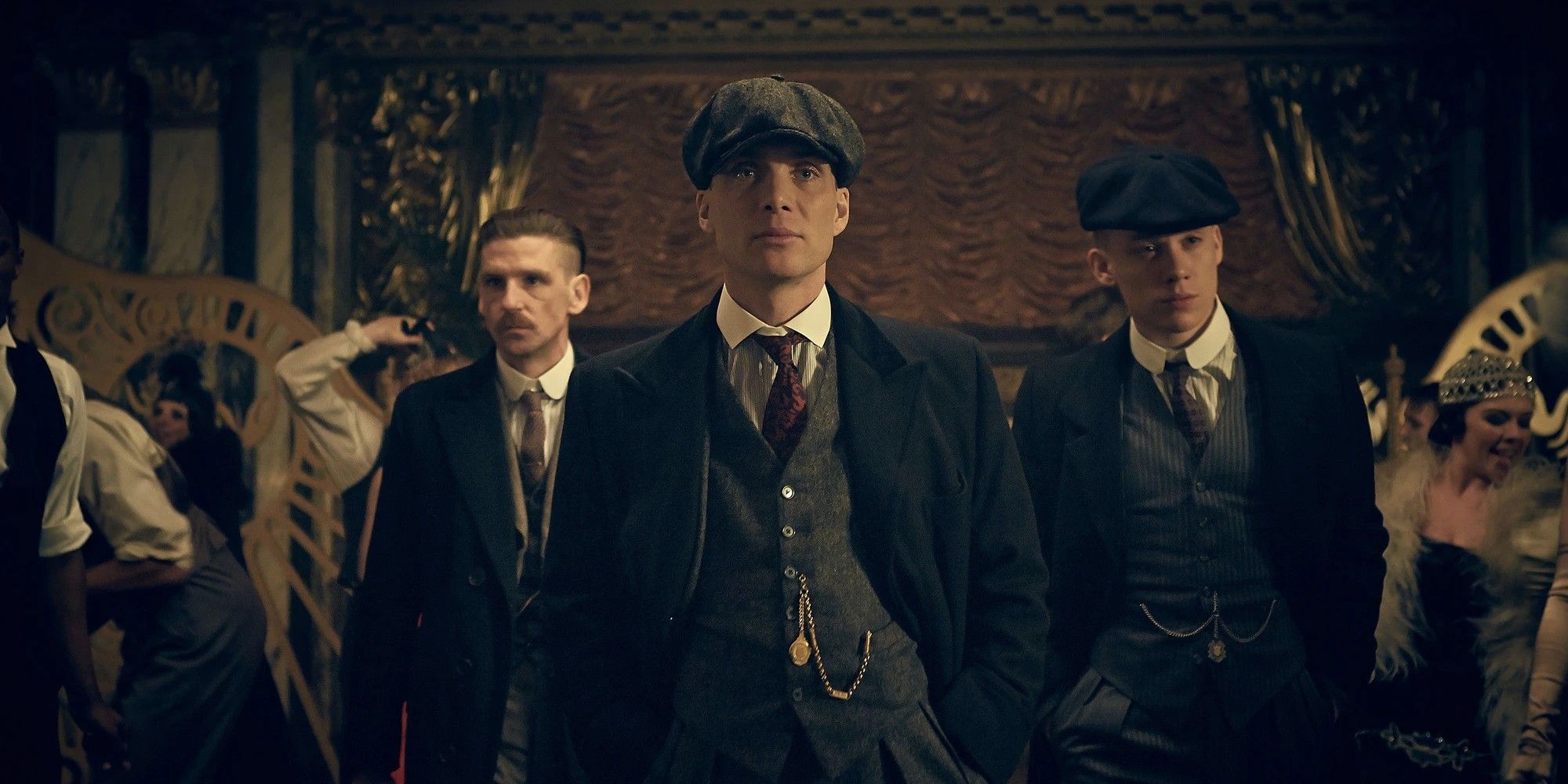 Arthur, Tommy and John Shelby walking into a party in Peaky Blinders.