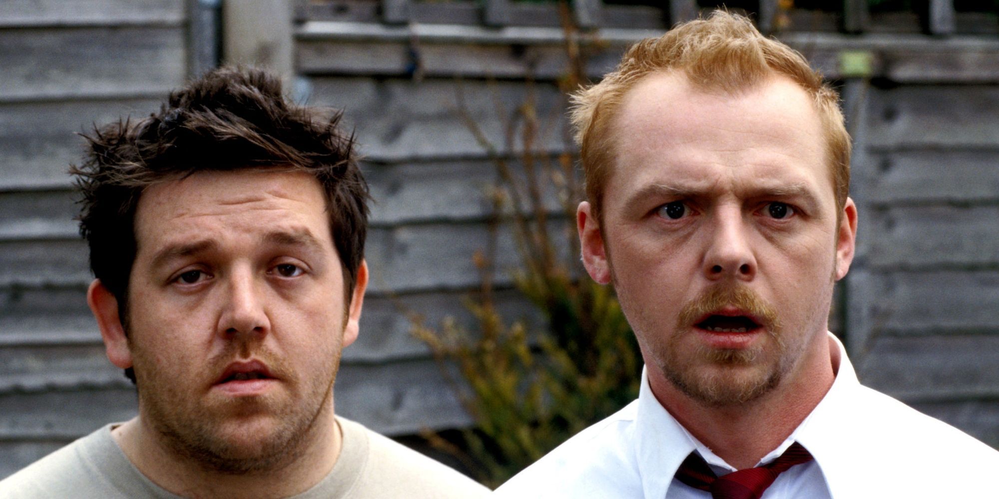 Nick Frost as Ed and Simon Pegg as Shaun staring straight ahead in Shaun of the Dead