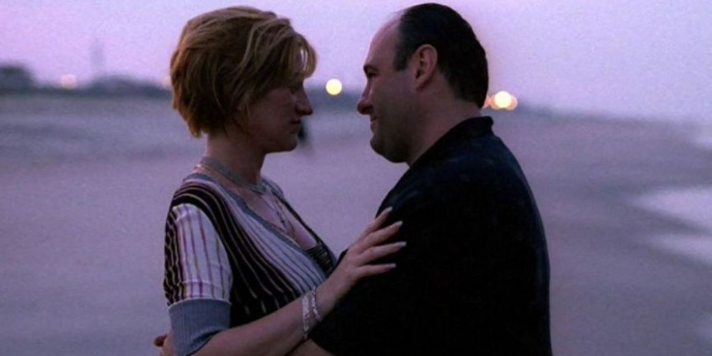 Carmela and Tony embracing on the beach in The Sopranos