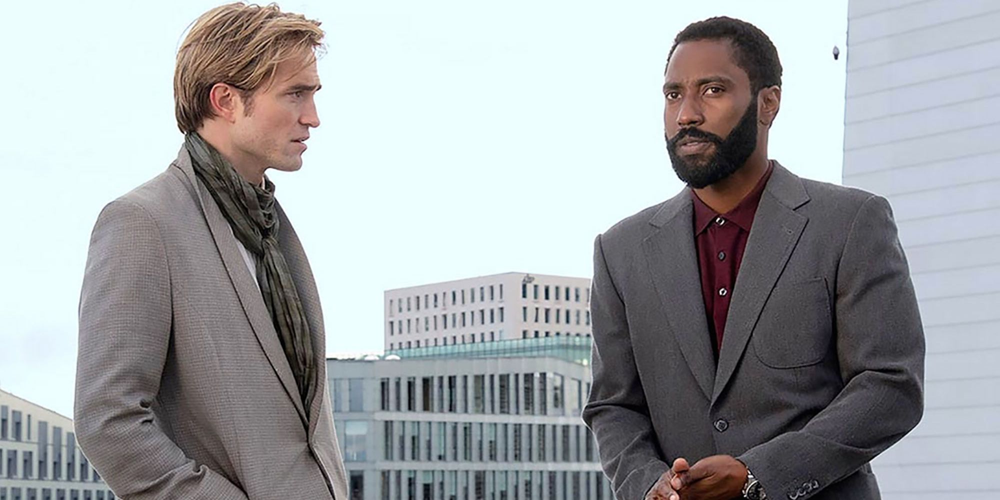 Robert Pattinson (left) and John David Washington (right)