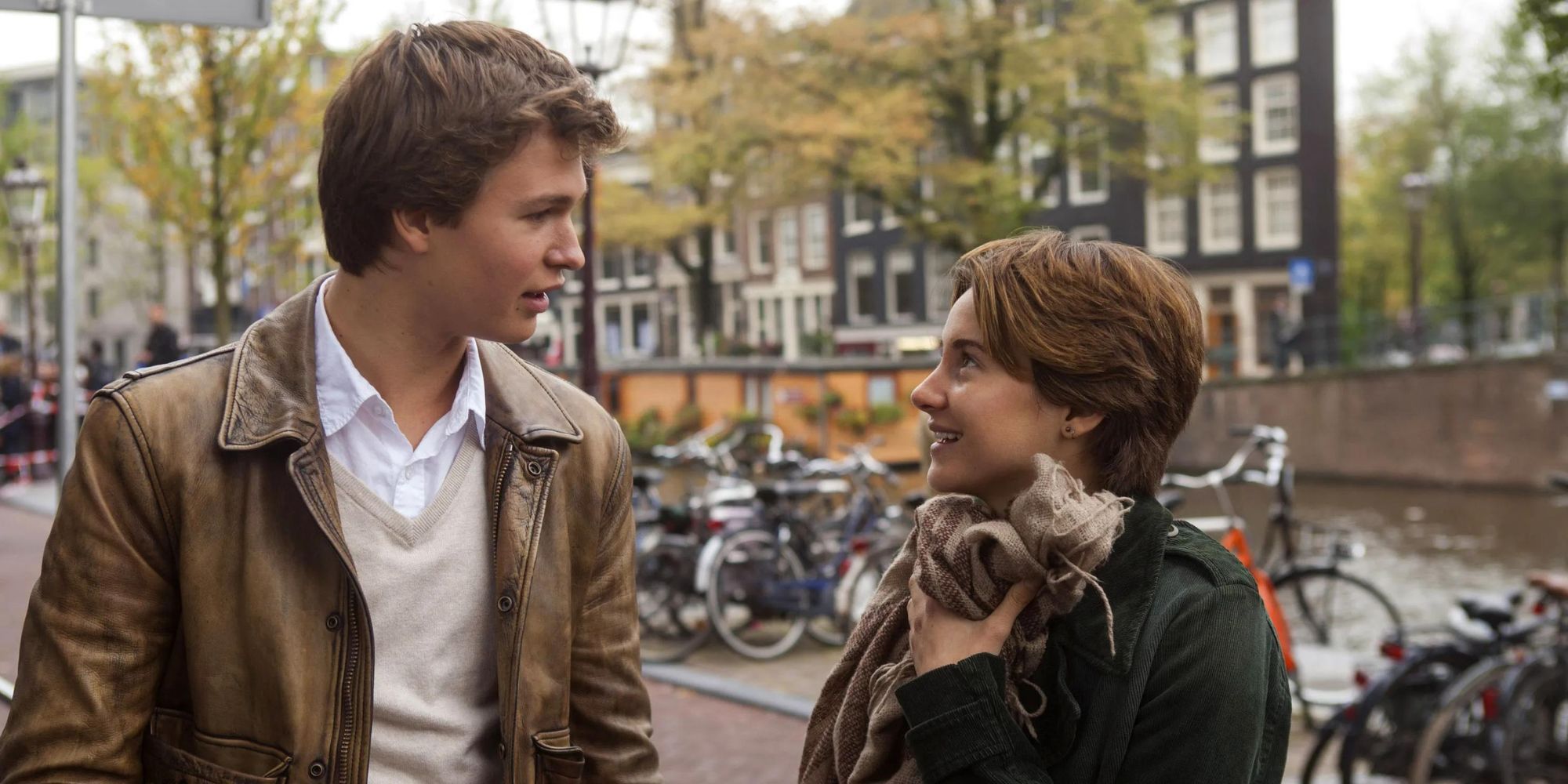 Ansel Elgort as Augustus and Shailene Woodley as Hazel from The Fault In Our Stars talking to each other
