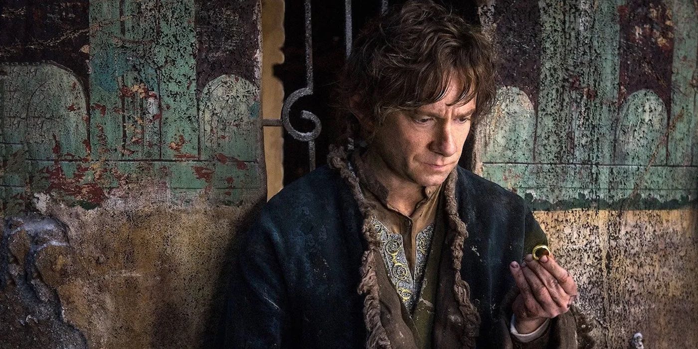 Martin Freeman as Bilbo Baggins holding the One Ring in The Hobbit- The Battle of the Five Armies