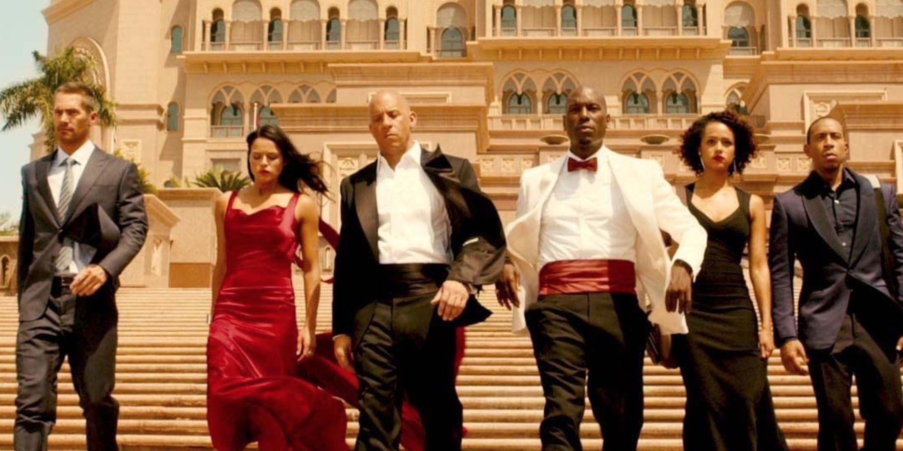 Vin Diesel, Ludacris, Michelle Rodriguez, Tyrese Gibson, Paul Walker, Nathalie Emmanuel, Cody Walker, and Caleb Walker in 'Furious 7'