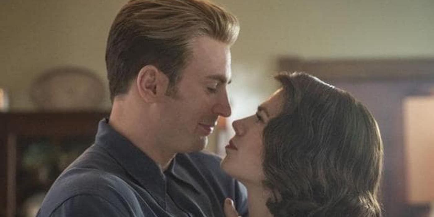 Chris Evans as Steve Rogers/Captain America embracing Hayley Atwell as Peggy Carter in Avengers: End Game
