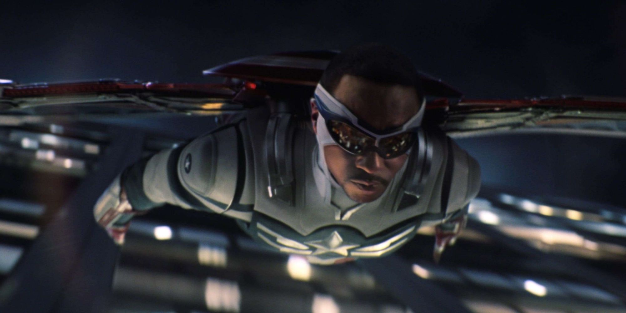 Anthony Mackie as Sam Wilson flying as Captain America