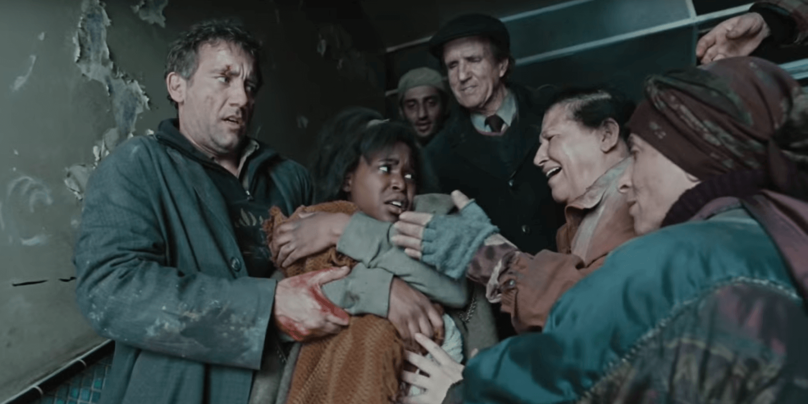 children of men, crowding around baby, Ranking the films of Alfonso Cuarón, clive owen, 